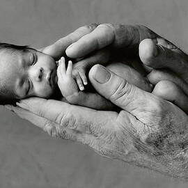 Jack holding Maneesha by Anne Geddes