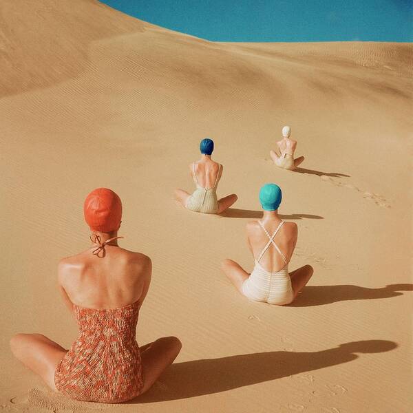 Wall Art - Photograph - Models Sitting On Sand Dunes by Clifford Coffin