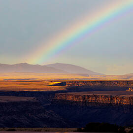 Rainbow crossing the Rio Grande Gorge  by Elijah Rael