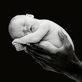 Tony holding Georgia by Anne Geddes